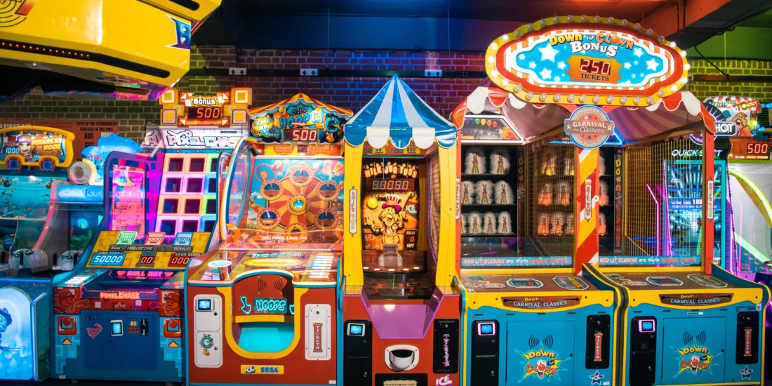 A large arcade machine featuring a variety of different games for players to enjoy