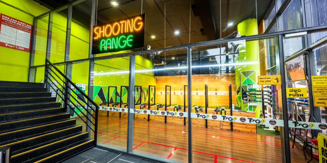 View of the indoor shooting range, showcasing shooting lanes and target boards for practice