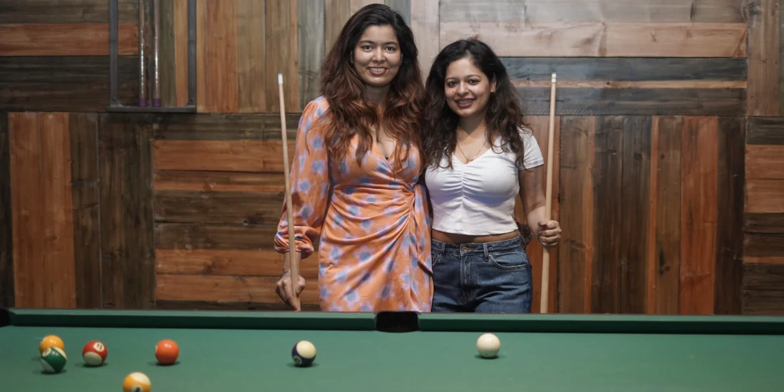 Women with 8pool stick giving pose