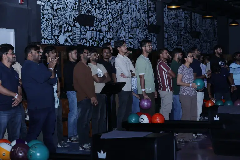 Image shown of people standing for torq corporate team outing in bangalore