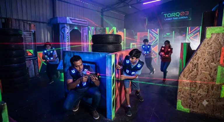 Friends playing laser tag at TORQ03 Bangalore